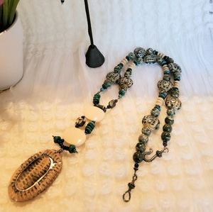 One of kind necklace and earrings.